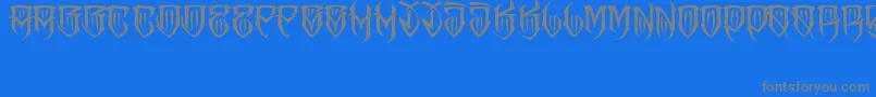 フォントJakejarkorFelona – 青い背景に灰色の文字