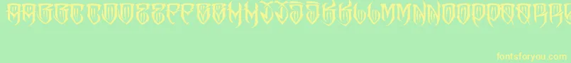 フォントJakejarkorFelona – 黄色の文字が緑の背景にあります