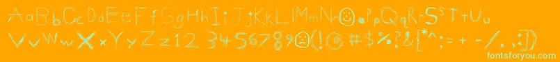 GigglesShits Font – Green Fonts on Orange Background