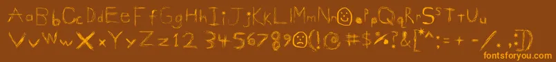 GigglesShits Font – Orange Fonts on Brown Background