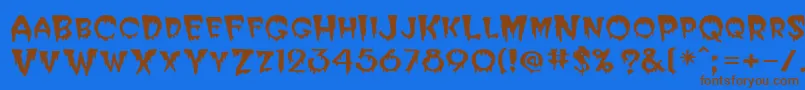 PostcryptMedium-fontti – ruskeat fontit sinisellä taustalla