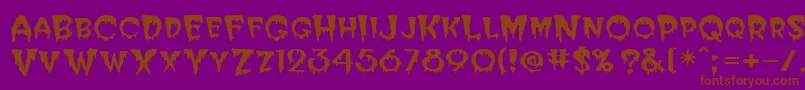 フォントPostcryptMedium – 紫色の背景に茶色のフォント