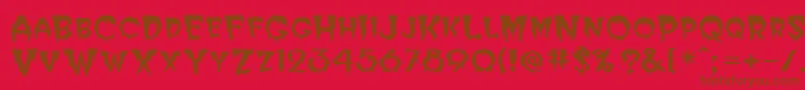 PostcryptMedium-Schriftart – Braune Schriften auf rotem Hintergrund