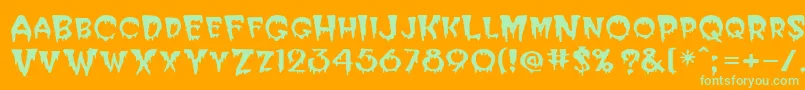 PostcryptMedium-Schriftart – Grüne Schriften auf orangefarbenem Hintergrund