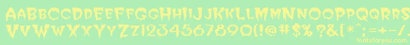 PostcryptMedium-fontti – keltaiset fontit vihreällä taustalla