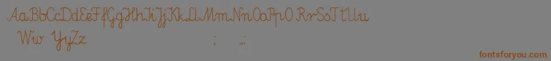 Elementarz-Schriftart – Braune Schriften auf grauem Hintergrund