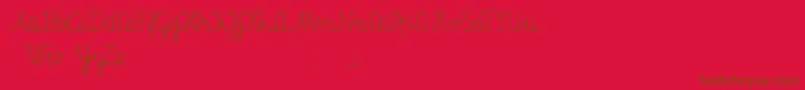 Elementarz-Schriftart – Braune Schriften auf rotem Hintergrund
