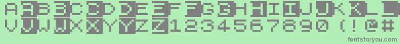 フォントZx81 – 緑の背景に灰色の文字