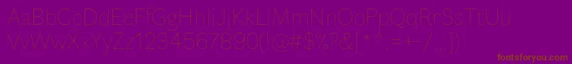 FauneDisplayThin-Schriftart – Braune Schriften auf violettem Hintergrund