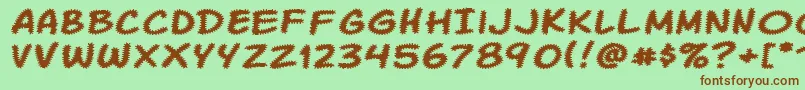 KomikaTread Font – Brown Fonts on Green Background