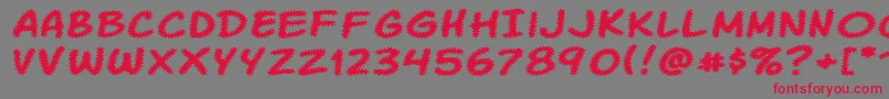 KomikaTread-Schriftart – Rote Schriften auf grauem Hintergrund