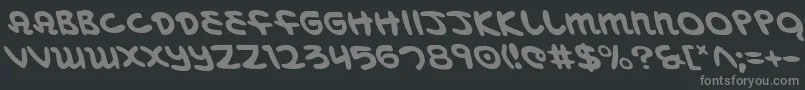 MagicBeansLeftalic-fontti – harmaat kirjasimet mustalla taustalla