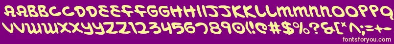 MagicBeansLeftalic-Schriftart – Gelbe Schriften auf violettem Hintergrund