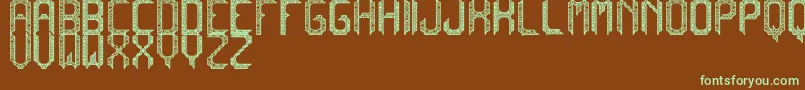 フォントCadabraDebilex – 緑色の文字が茶色の背景にあります。