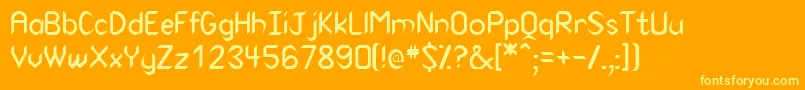 VirtuasskRegular Font – Yellow Fonts on Orange Background