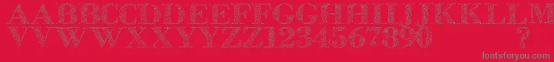 フォントZsylett – 赤い背景に灰色の文字