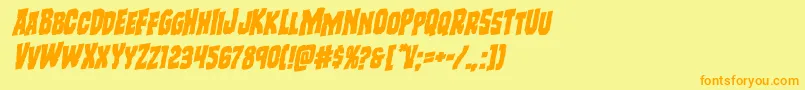 フォントFreakfinderrotal – オレンジの文字が黄色の背景にあります。