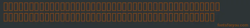 Шрифт WbxkomixBold – коричневые шрифты на чёрном фоне