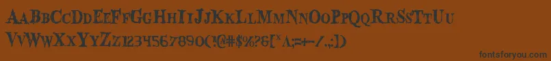 BloodCrowCondensed-Schriftart – Schwarze Schriften auf braunem Hintergrund