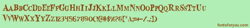 Fonte BloodCrowCondensed – fontes marrons em um fundo verde