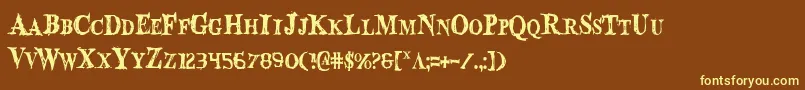 BloodCrowCondensed-fontti – keltaiset fontit ruskealla taustalla