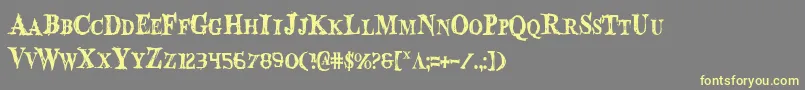 BloodCrowCondensed Font – Yellow Fonts on Gray Background