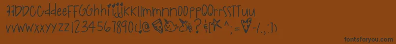 Indigoracers Font – Black Fonts on Brown Background