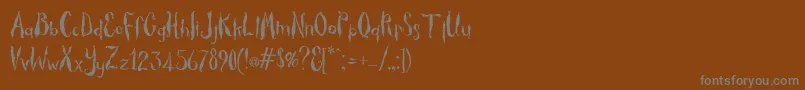 フォントThicket – 茶色の背景に灰色の文字