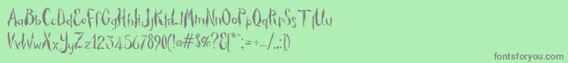 フォントThicket – 緑の背景に灰色の文字