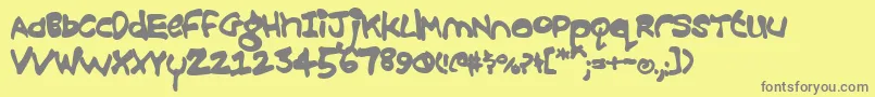 フォントCroobie ffy – 黄色の背景に灰色の文字