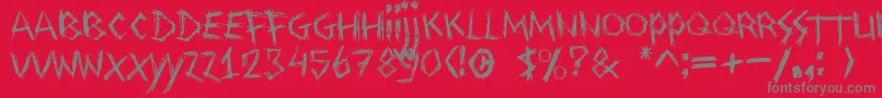 Drawingblood-fontti – harmaat kirjasimet punaisella taustalla