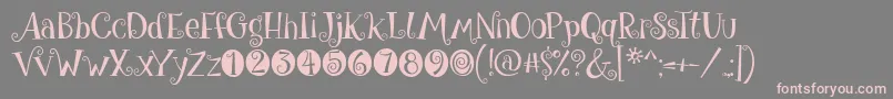 フォントGiveMeSomeSugar – 灰色の背景にピンクのフォント