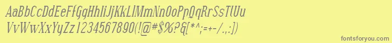フォントSfcovingtoncondItalic – 黄色の背景に灰色の文字
