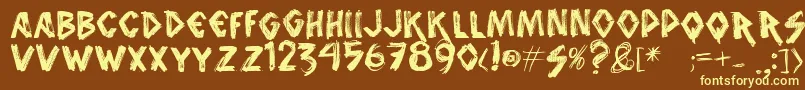 Vtksanimal2-fontti – keltaiset fontit ruskealla taustalla