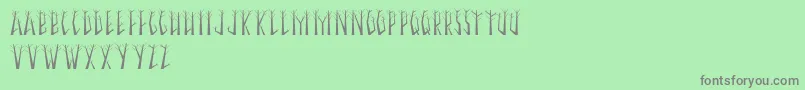 SeasonalTrees Font – Gray Fonts on Green Background