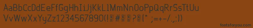 フォントRotorDemo – 黒い文字が茶色の背景にあります