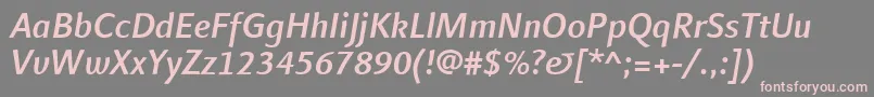 フォントLinotypefinneganMediumitalic – 灰色の背景にピンクのフォント
