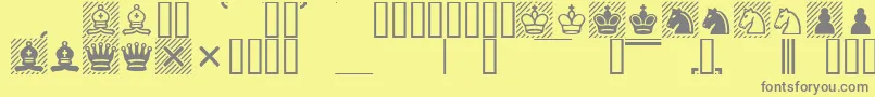 Casefont-fontti – harmaat kirjasimet keltaisella taustalla