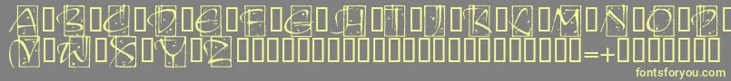 KendoinitialsitcTt Font – Yellow Fonts on Gray Background