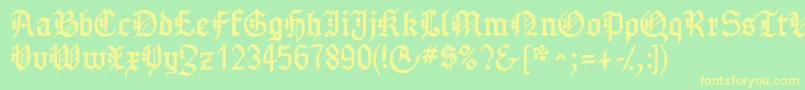 フォントGotenborgfraktur – 黄色の文字が緑の背景にあります