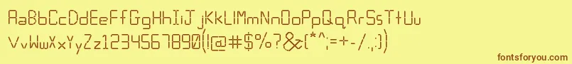 Calculator-fontti – ruskeat fontit keltaisella taustalla