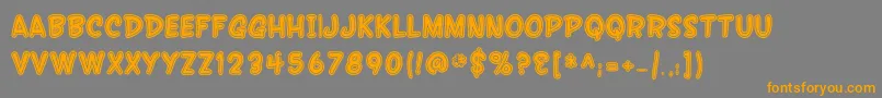SfWonderComicInline-Schriftart – Orangefarbene Schriften auf grauem Hintergrund