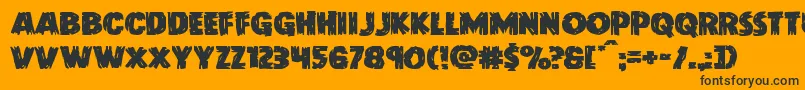 Doktermonstroexpand Font – Black Fonts on Orange Background