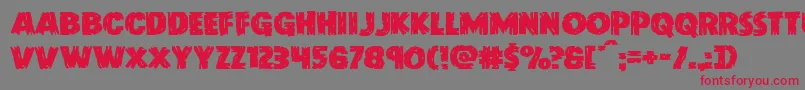 Doktermonstroexpand Font – Red Fonts on Gray Background