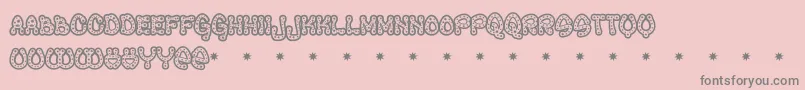 Ravequeen Font – Gray Fonts on Pink Background