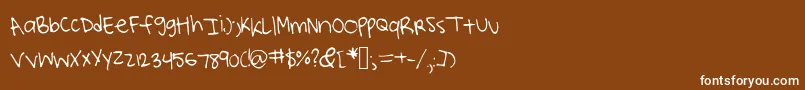 Lucysscribblingsフォントについての詳細 フォントLucysscribblings – 茶色の背景に白い文字