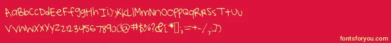 フォントLucysscribblings – 黄色の文字、赤い背景