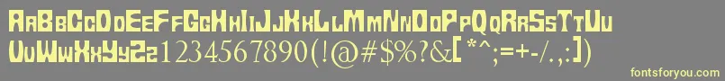 Tups13 Font – Yellow Fonts on Gray Background