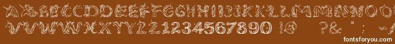 EenhoornLight-Schriftart – Weiße Schriften auf braunem Hintergrund