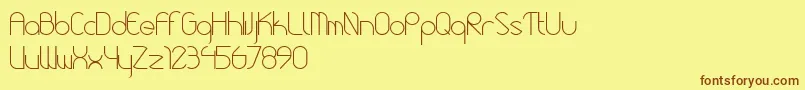 RoundyFontV1 Font – Brown Fonts on Yellow Background